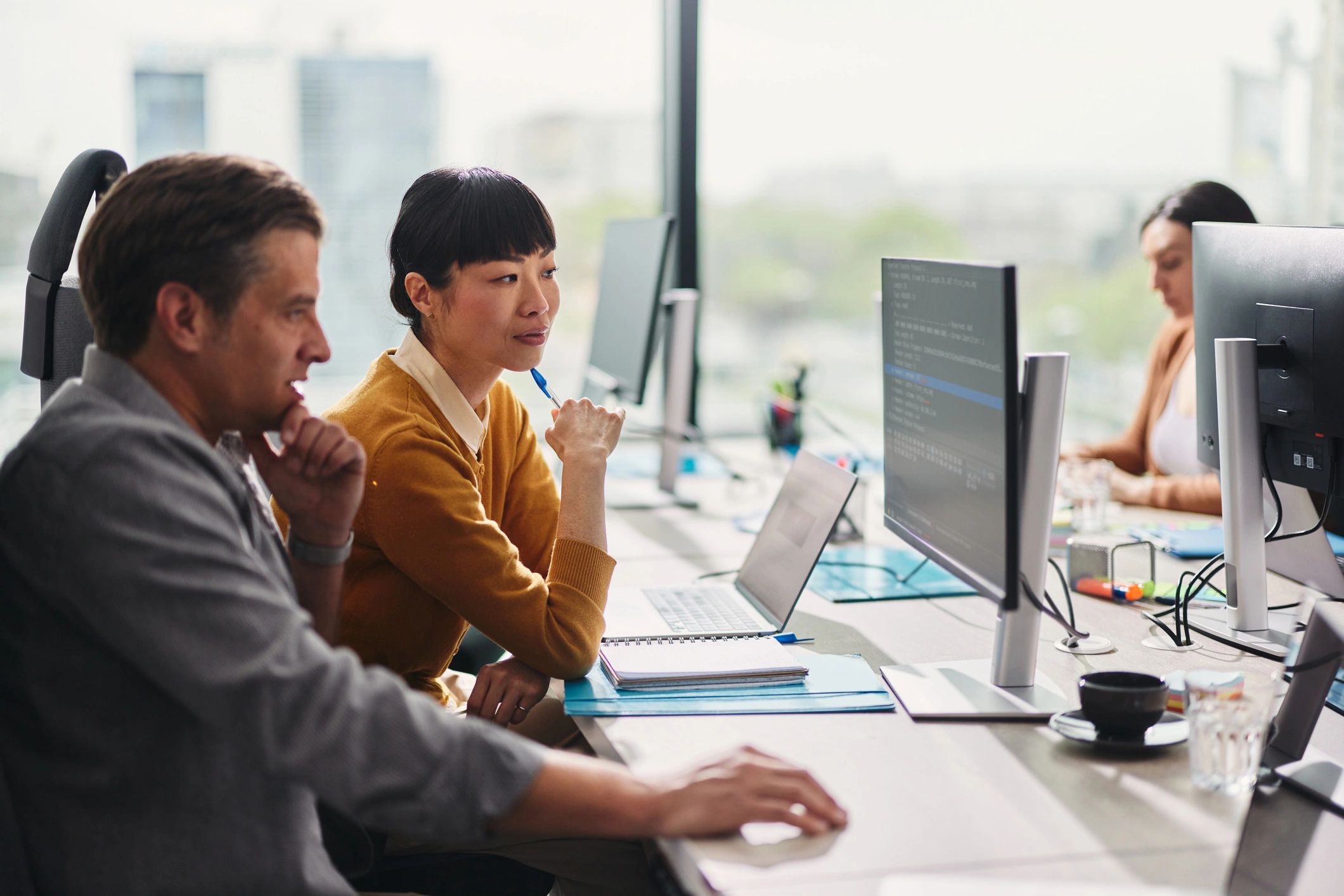 IT support professionals collaborating in an office