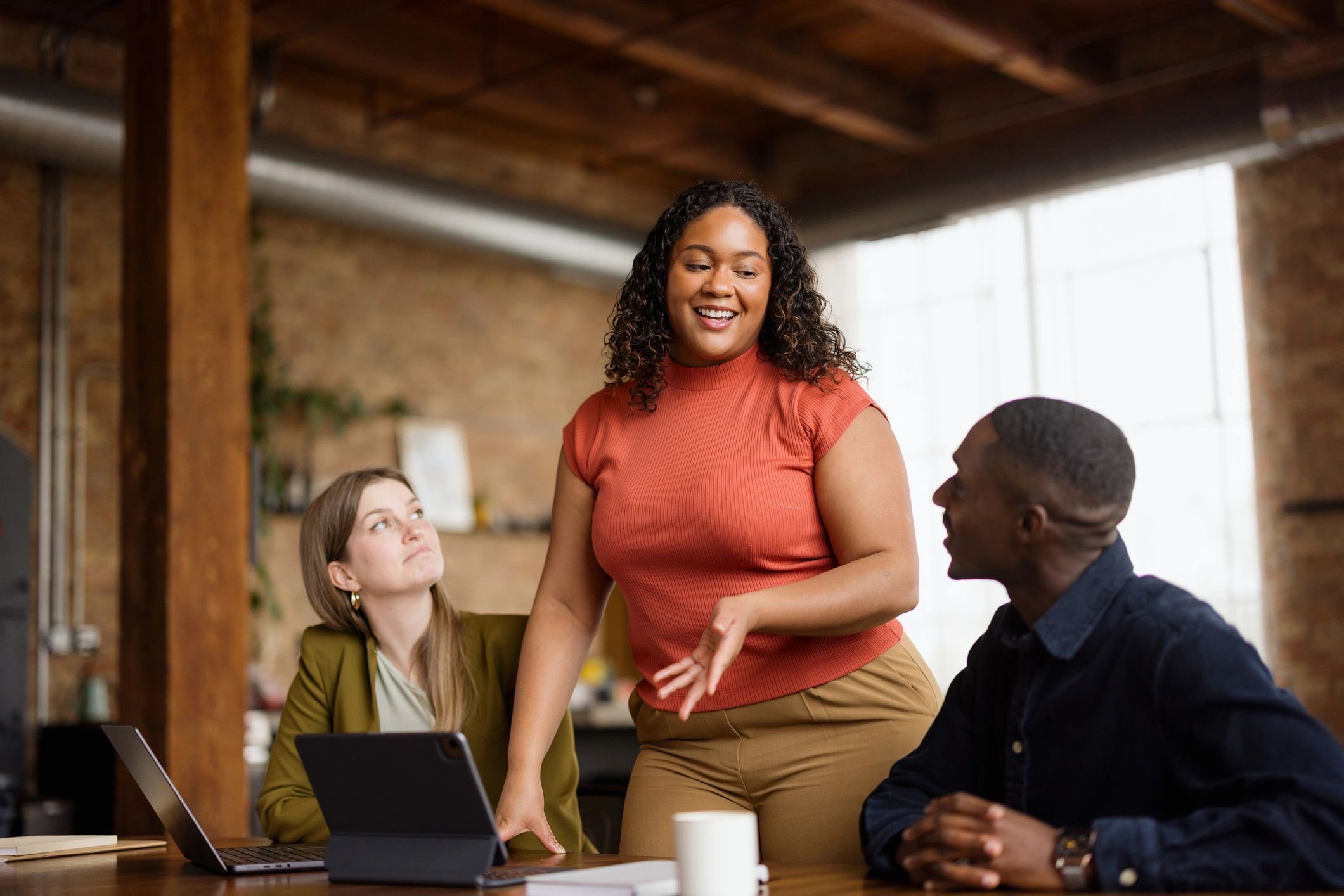 Team collaborating in a modern office meeting